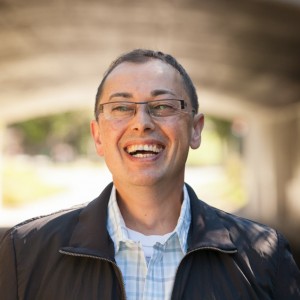 Stas laughing headshot